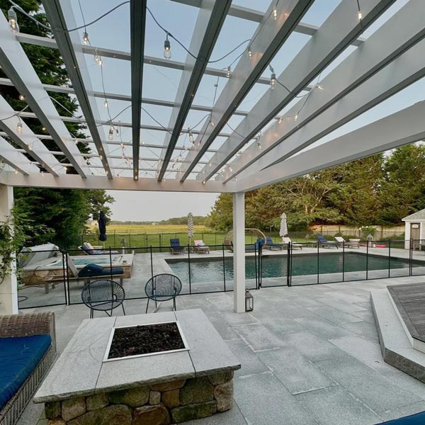 pergola and swimming pool in a backyard of a house